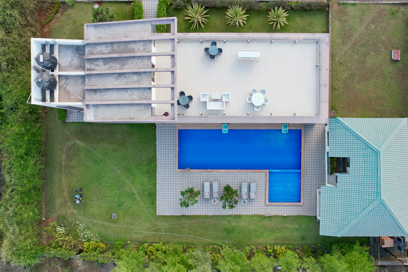 Aerial view of villas with pools and gardens in Dubai